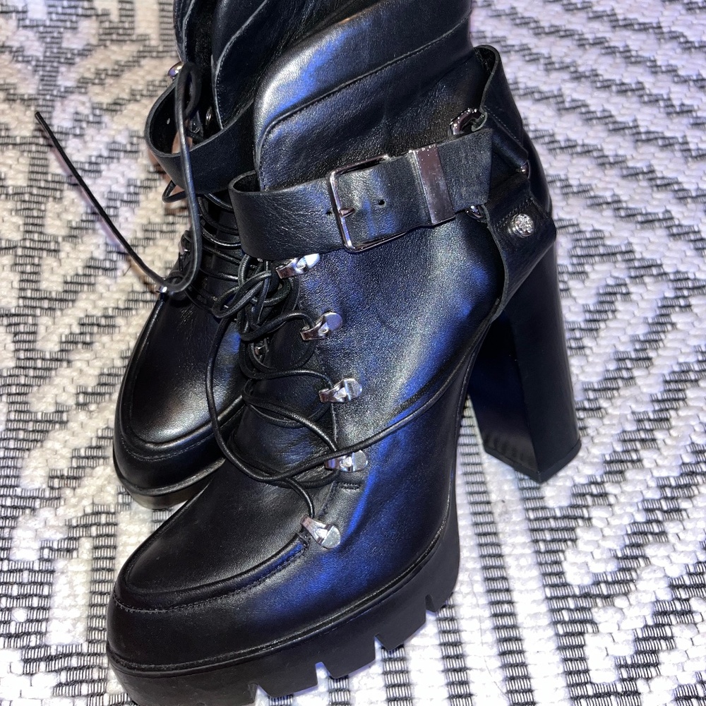 Black leather Zara Combat heels